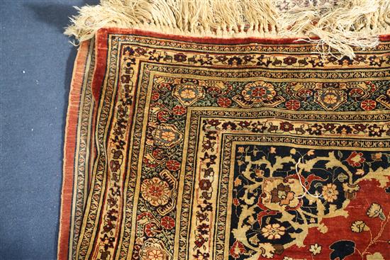 A Tabriz silk rug, 5ft 9in by 4ft 6in.